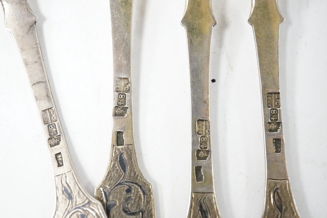 A set of four mid 19th century Russian 84 zolotnik and niello fiddle pattern dessert forks, assay master B.C. Moscow, 1853, 16.2cm, gross weight 4.1oz. Condition - poor to fair